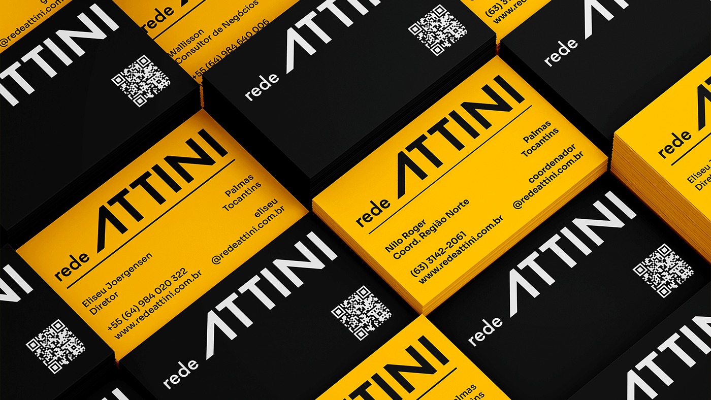Hero Rede Attini — cartões de visita amarelo e preto empilhados em ângulo